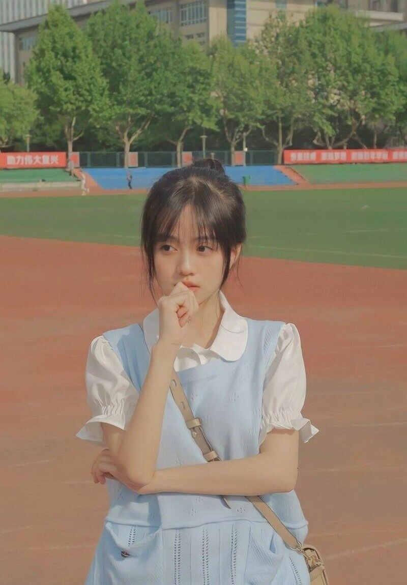 ảnh gái xinh búi tóc